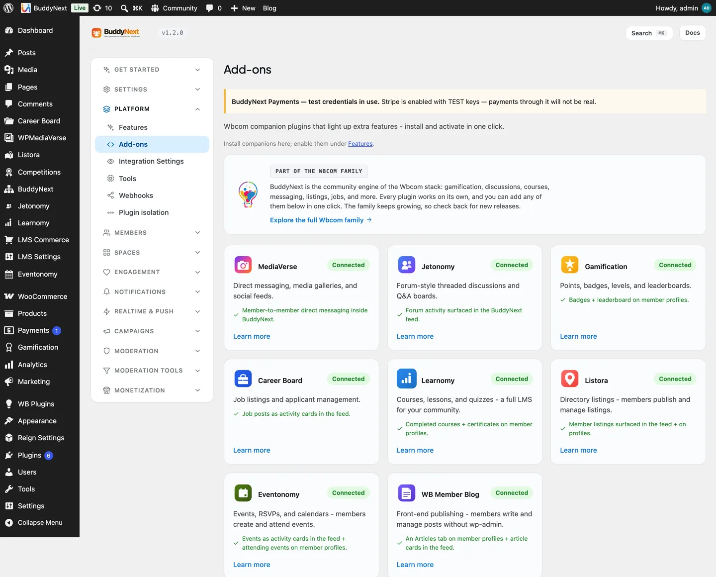 The BuddyNext Add-ons screen showing Listora connected alongside the rest of the Wbcom family, with its listings surfaced in the feed and on profiles