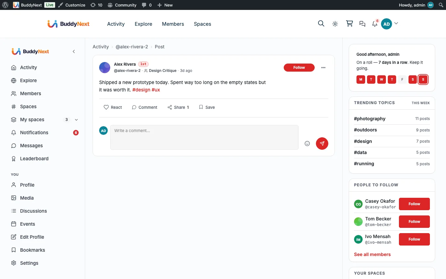 A BuddyNext post detail view showing reaction counts on the post and its comments