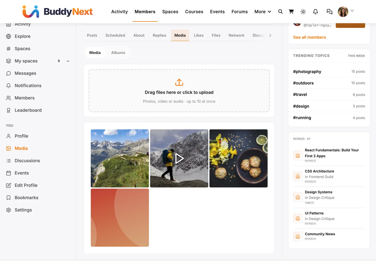 Media tab on a member profile with the upload area and the member's photos and videos